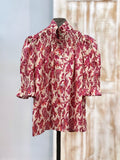 Camisa